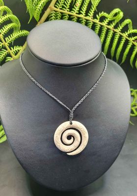 Carved Whale Bone Koru with Korus  WK033