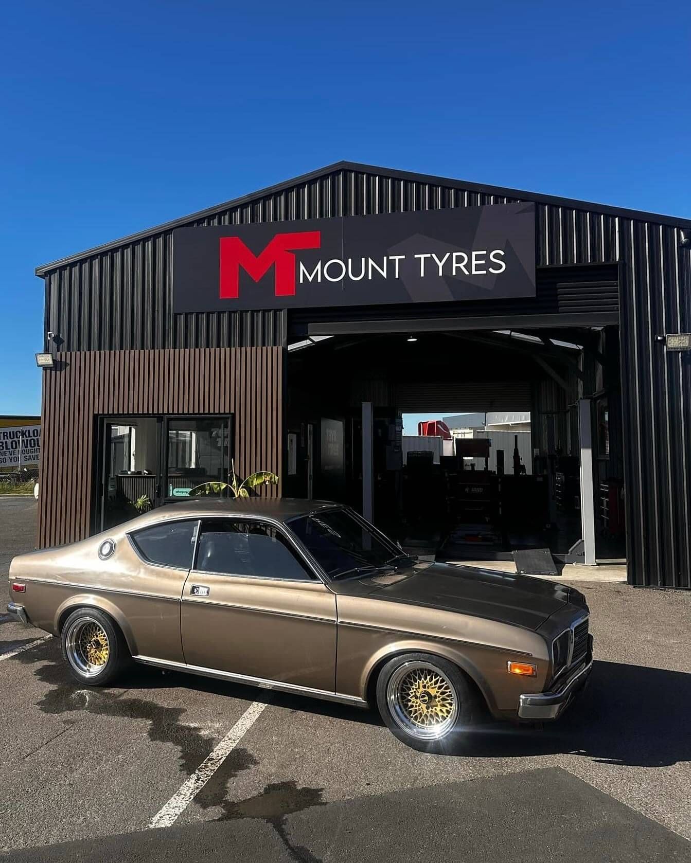 Photo of classic Holden parked outside Mount Tyres