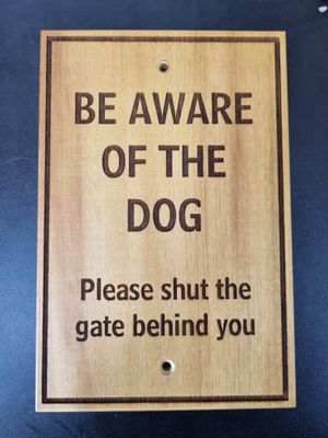 Beware of the dog outdoor sign
