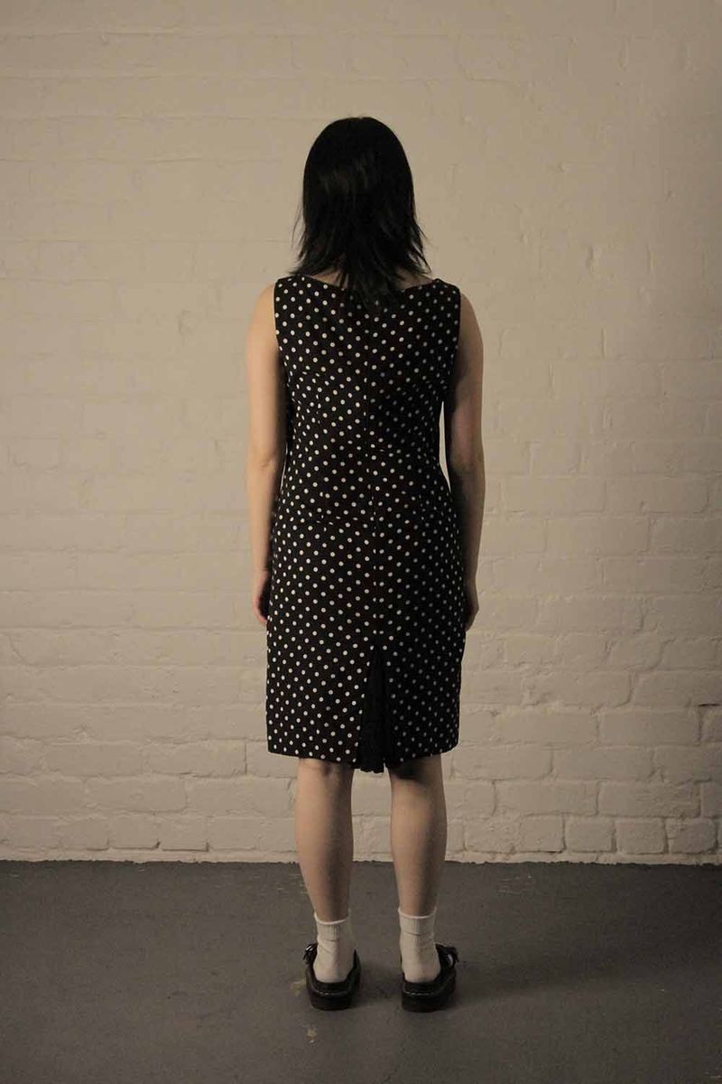 polka dot dress 90s 90's Black Polka dot dress with criss-cross back straps – Vida Antigua  Collective main image 1