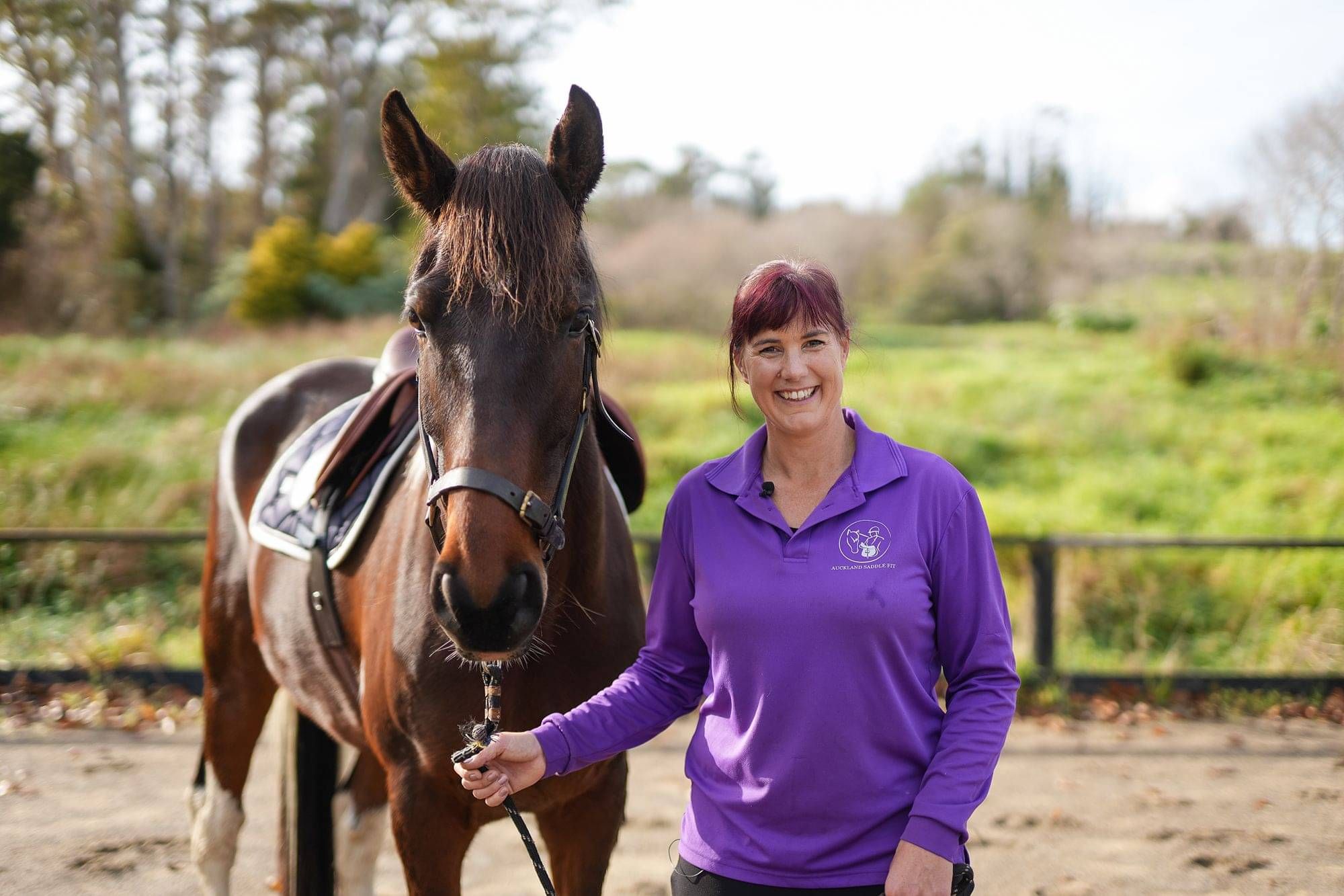 Christine, holistic saddle fitter, measuring horse's girth
