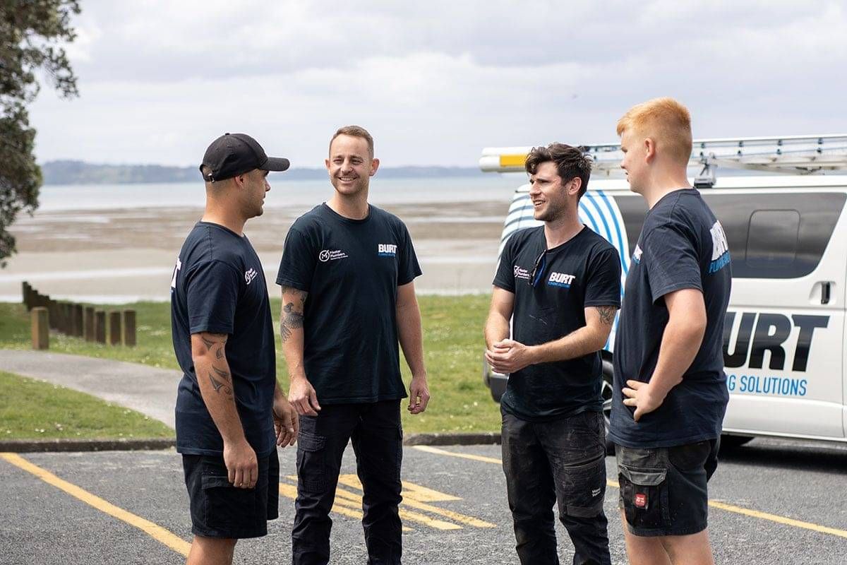 Professional team photo of plumbing business in Auckland