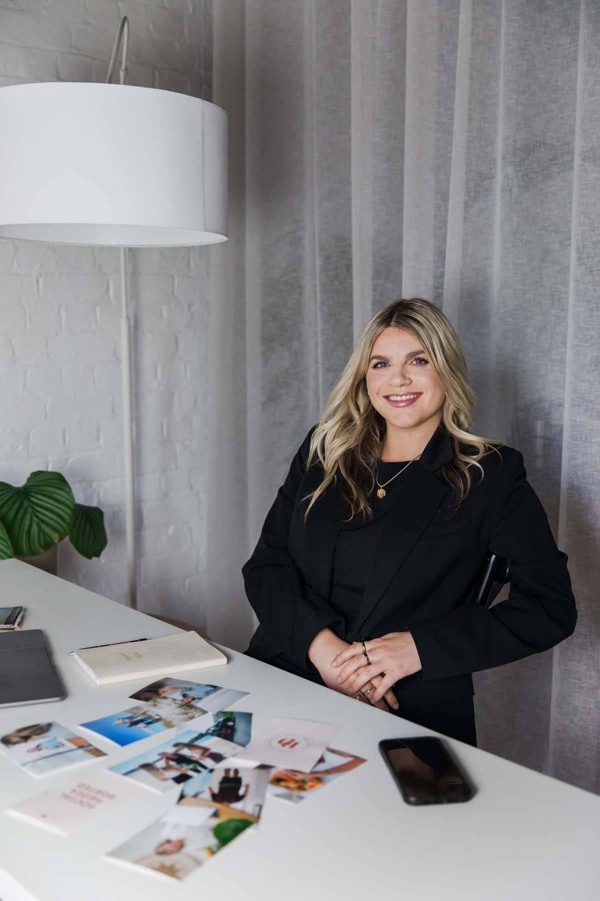 Image of Dynamic Digital founder Tayla sitting on couch