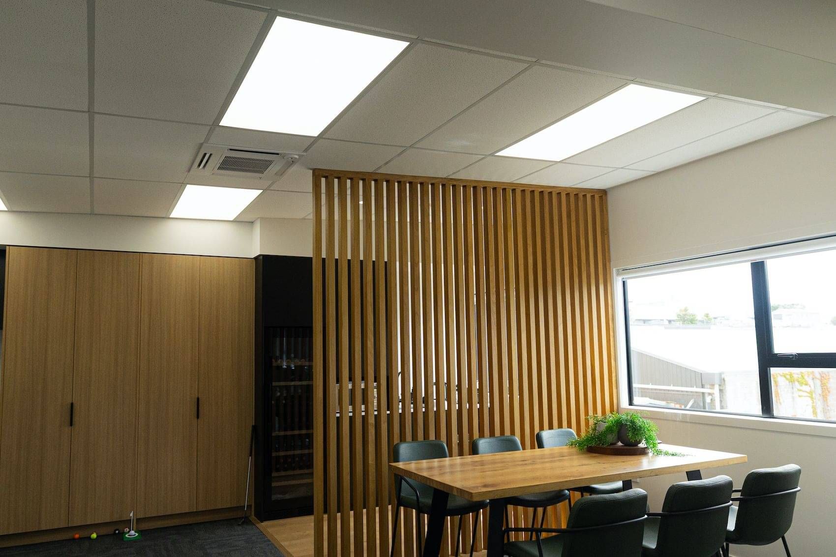 Office break space with upgraded lighting and electrical work