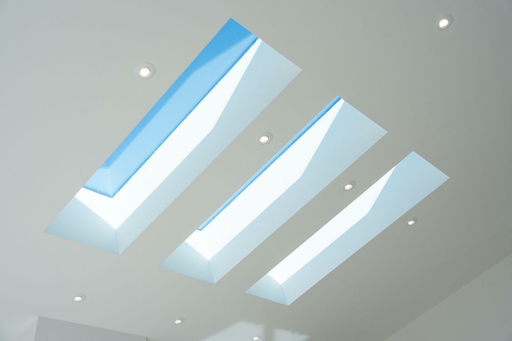 Downlights installed around skylights by residential electricians Tindalls Electrical