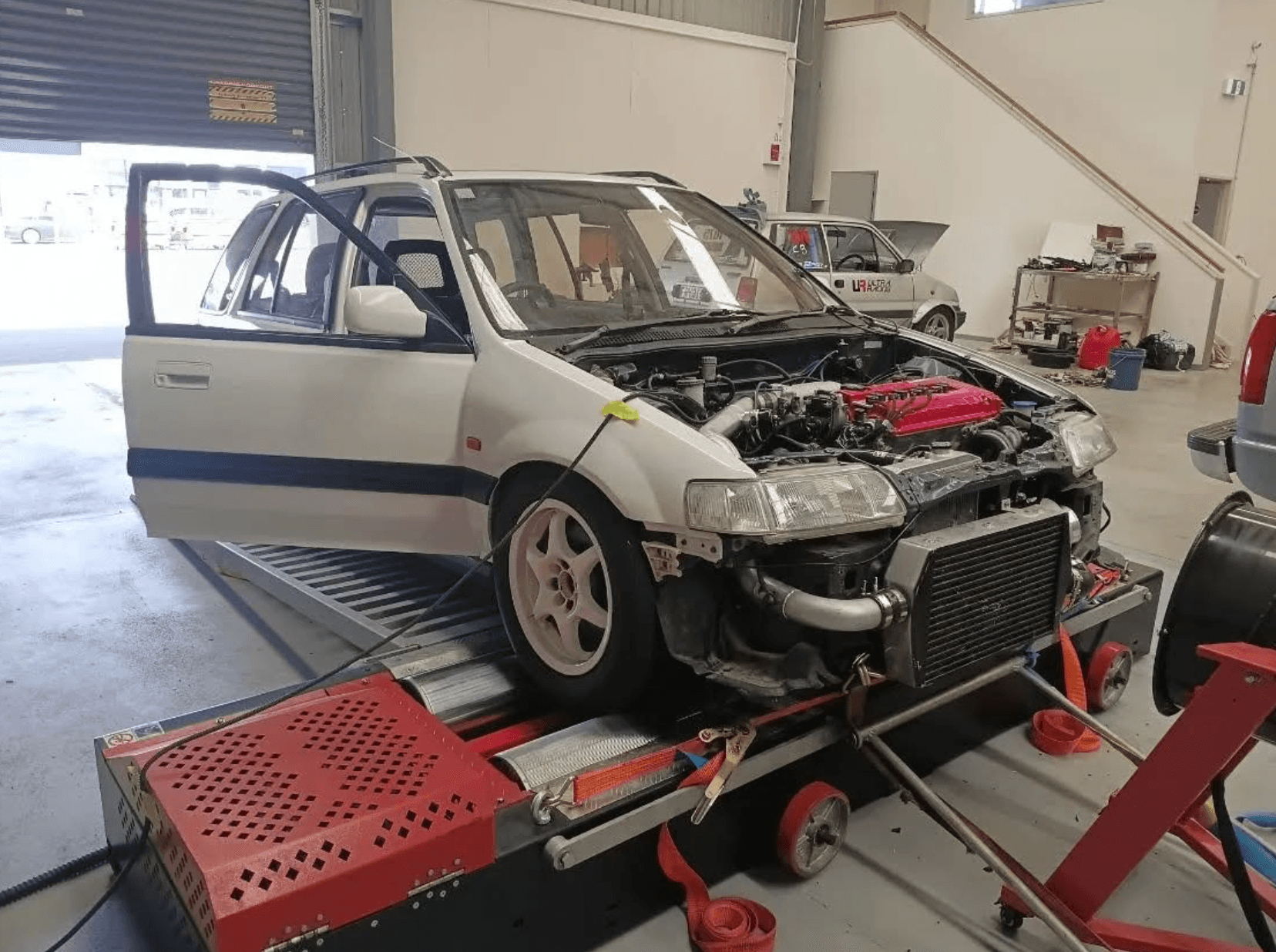 Cosber 2WD 1000 chassis dyno testing a front-wheel-drive car in Tauranga