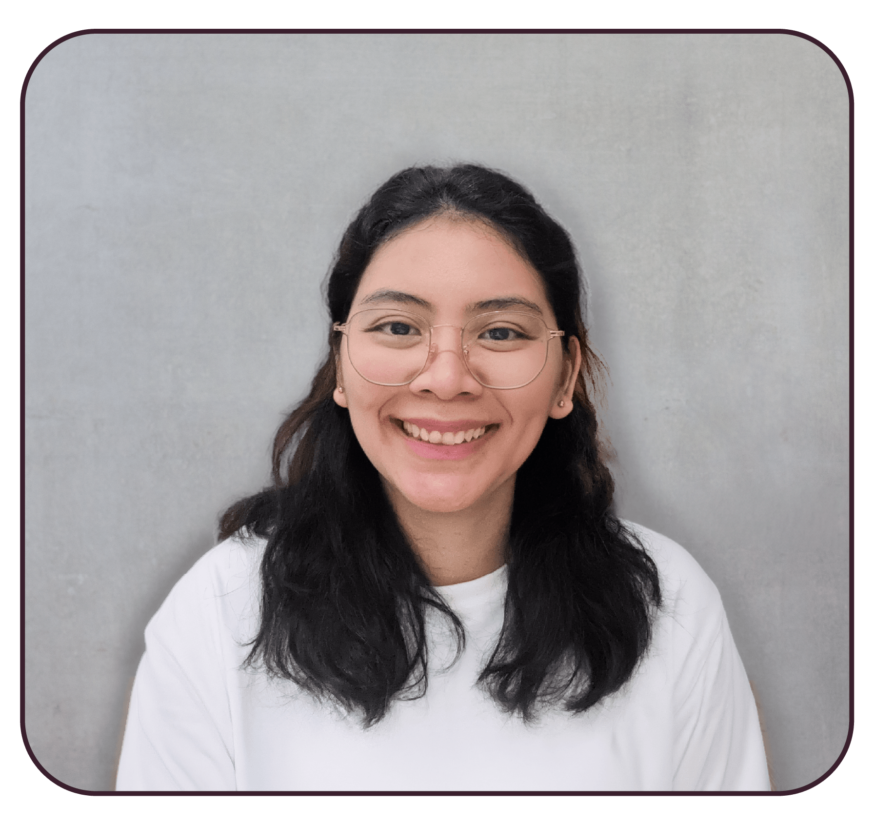 Ginna, our Graphic designer smiling framed by text repeating 'graphic designer' around the portrait