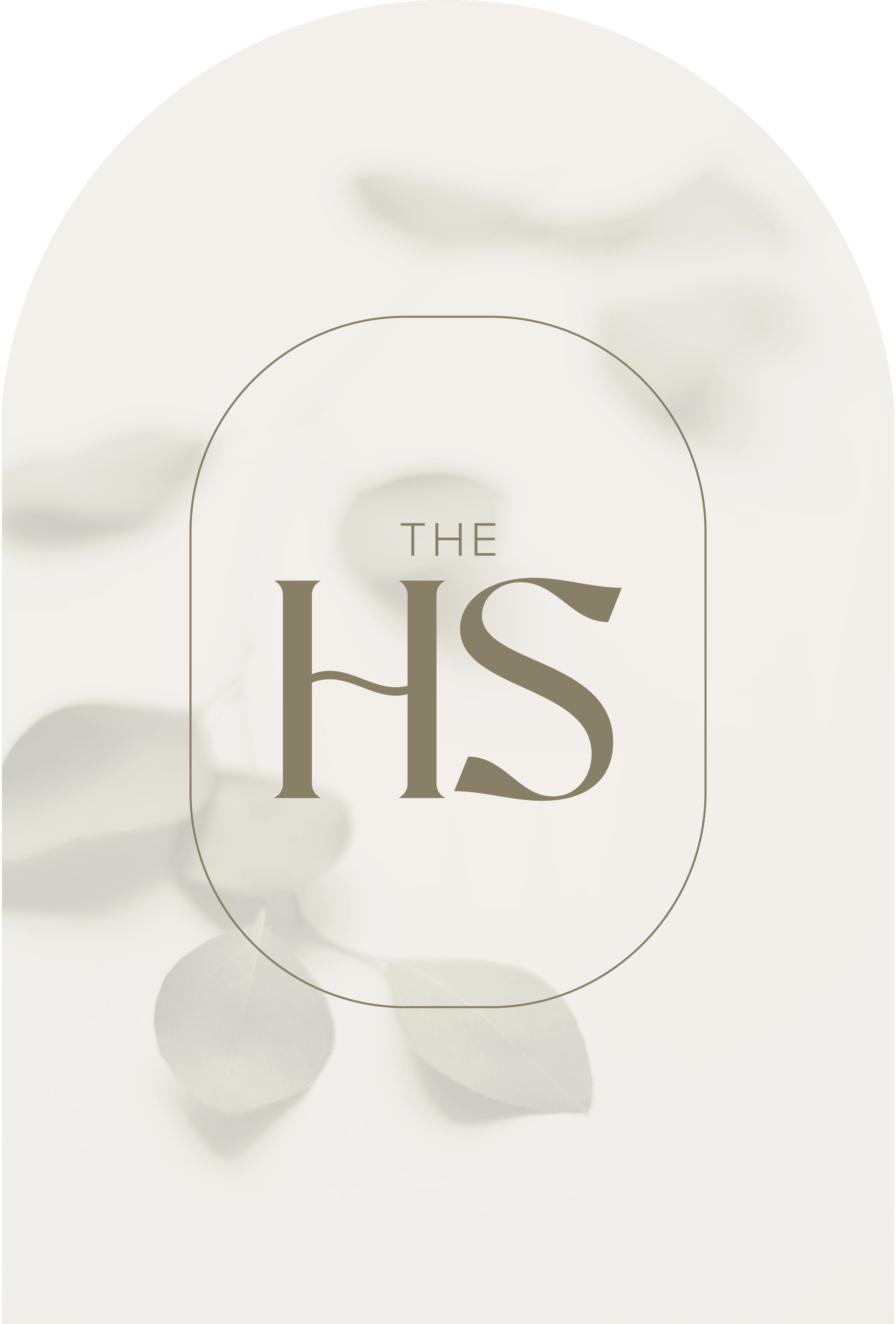Minimalist monogram for The Hair Studio, featuring "HS" in an elegant typeface, enclosed in an arched frame with soft leaf shadows in the background
