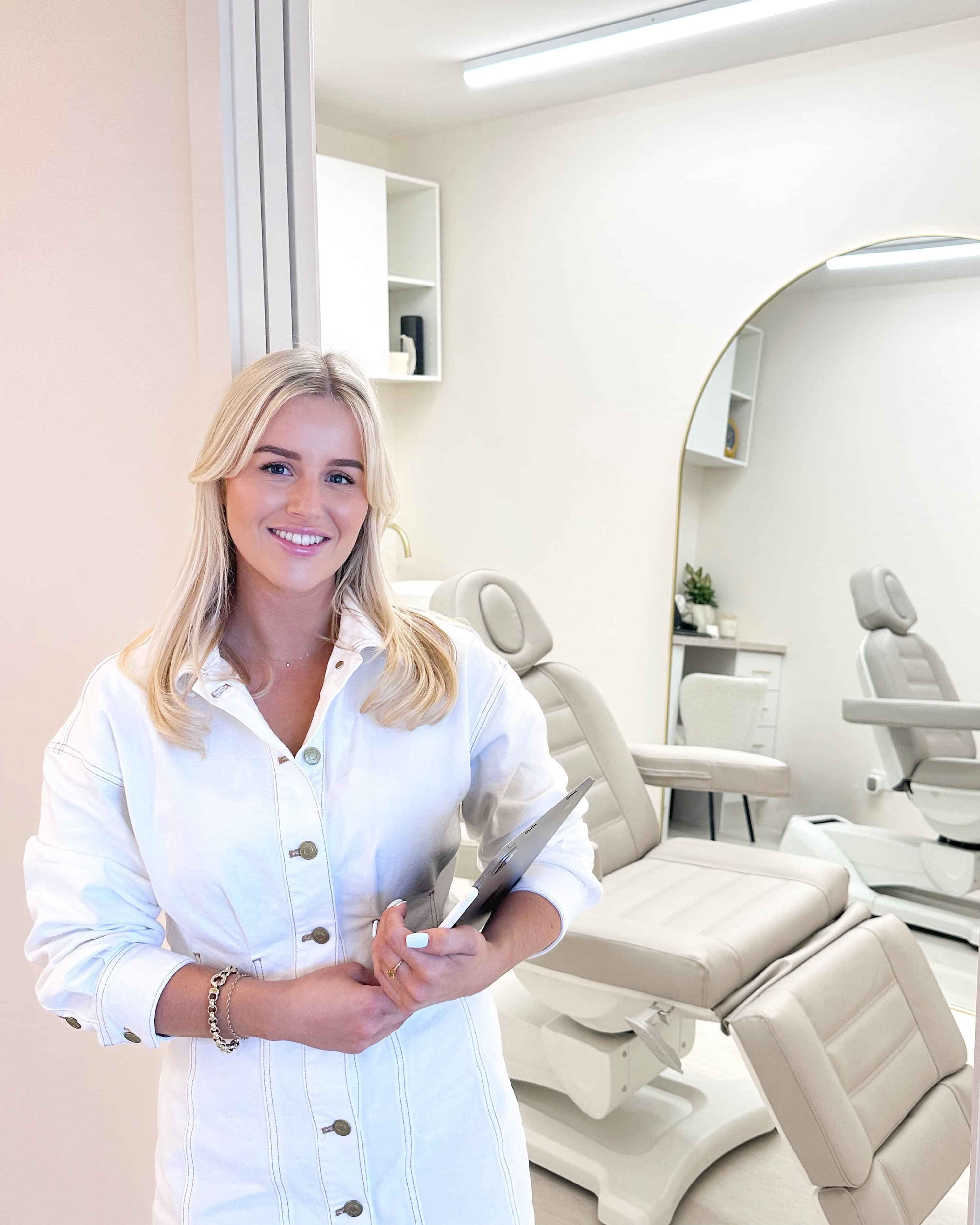 Photo of Cosmetic Injector Alex inside the treatment room at Bloom Aesthetics in Prebbleton, Christchurch