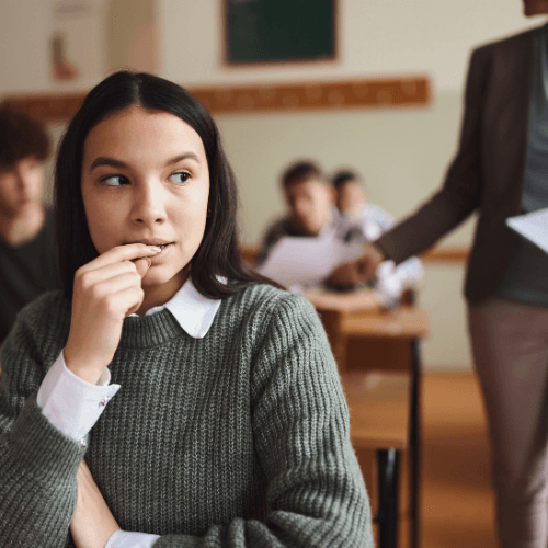 Woman stuck in maze trying to find her way to the exit