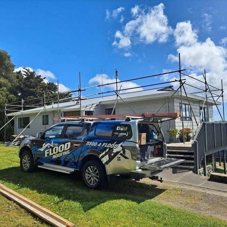 Flood Roofing Kerikeri Bay of Islands van with scaffolding on house