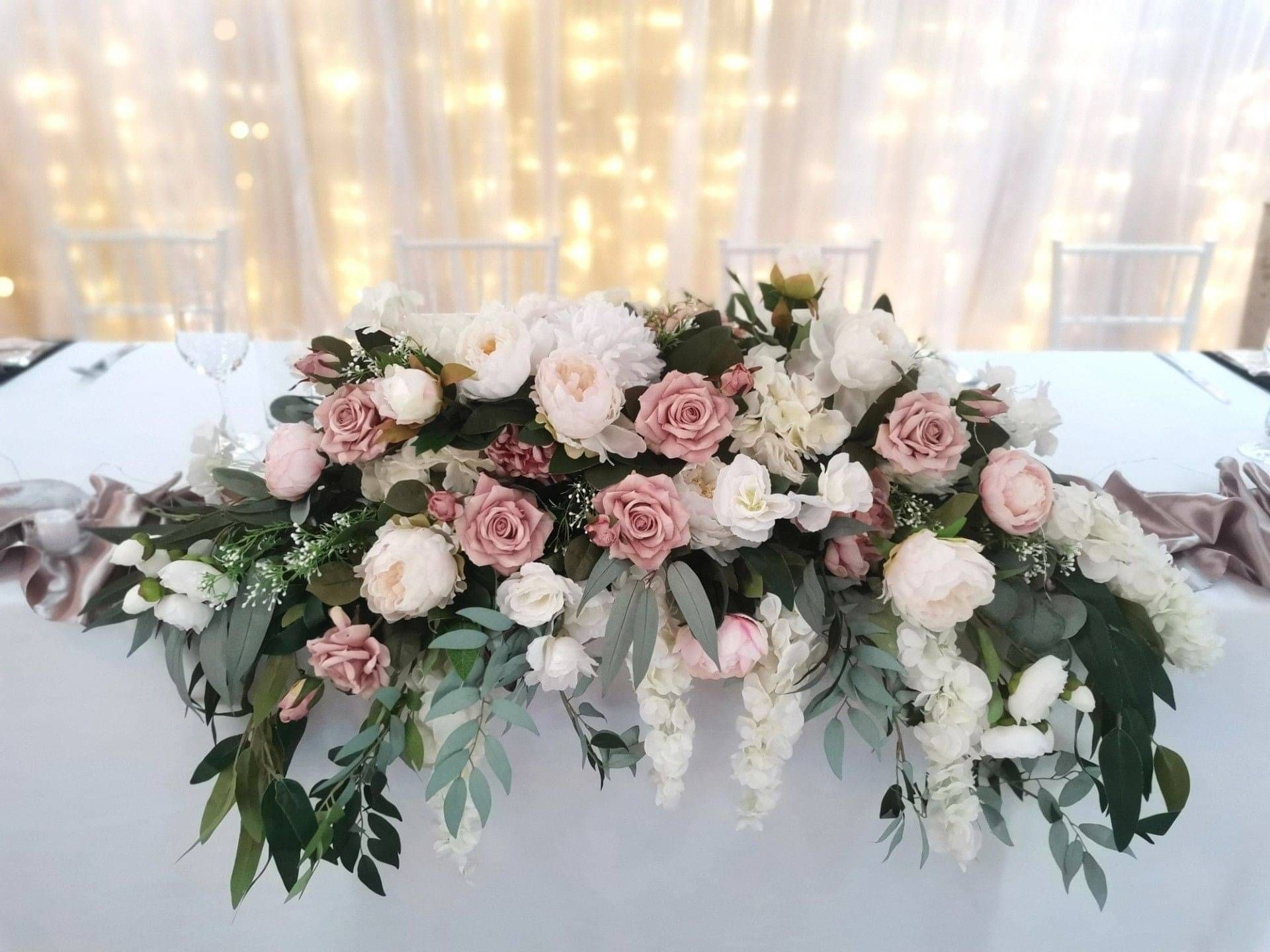 bride holding a white bouquet