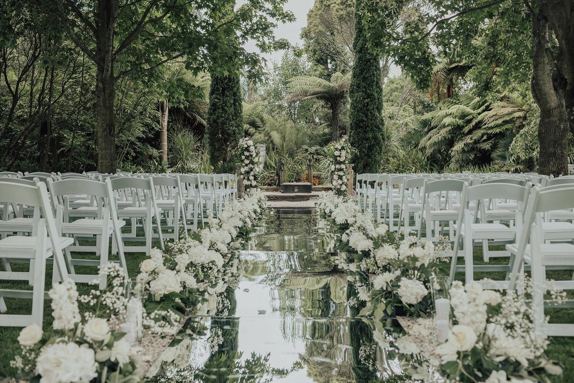 Markovina Vineyard Estate Couple posing in silhouette of barrels 