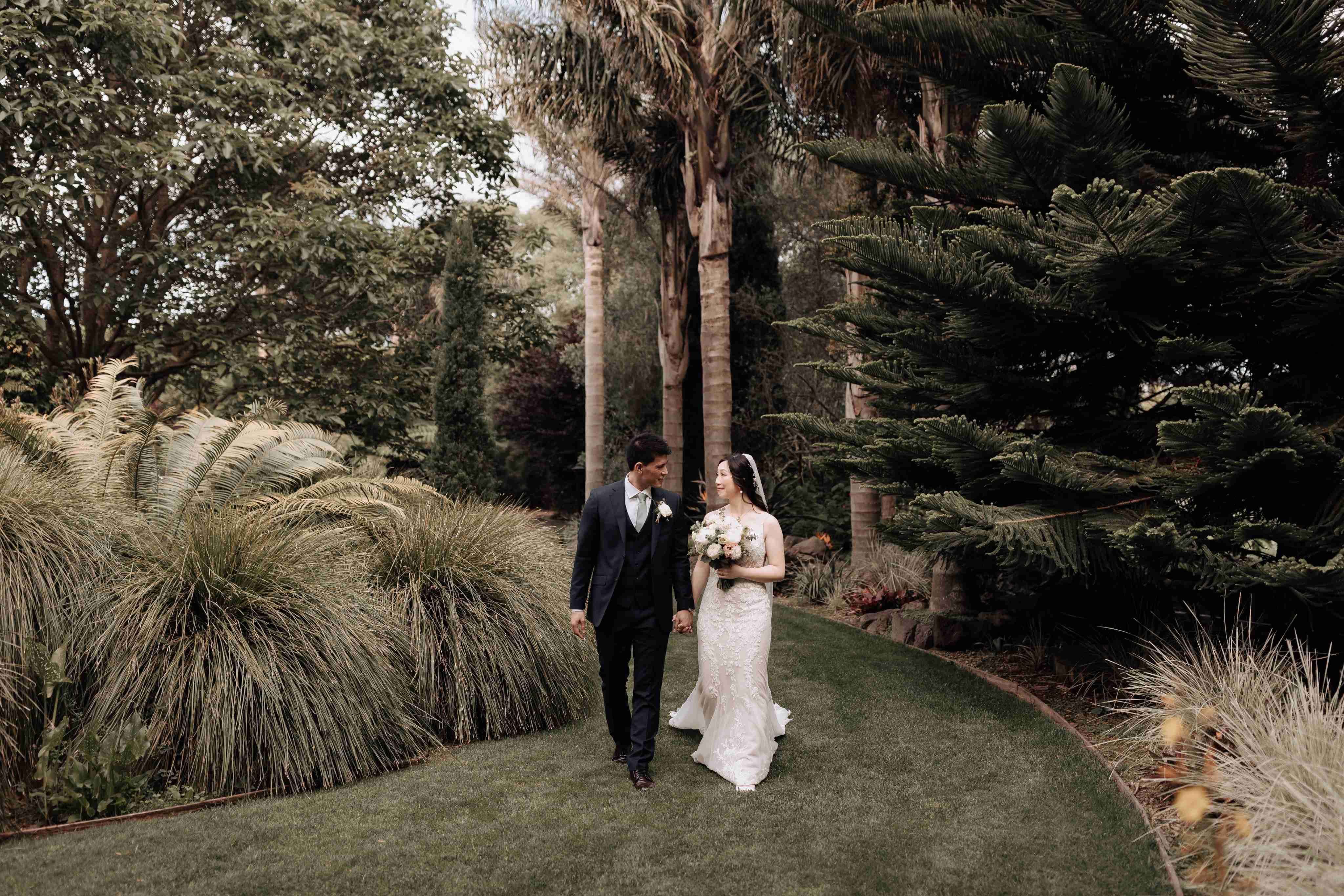 bride and groom walking outdoors