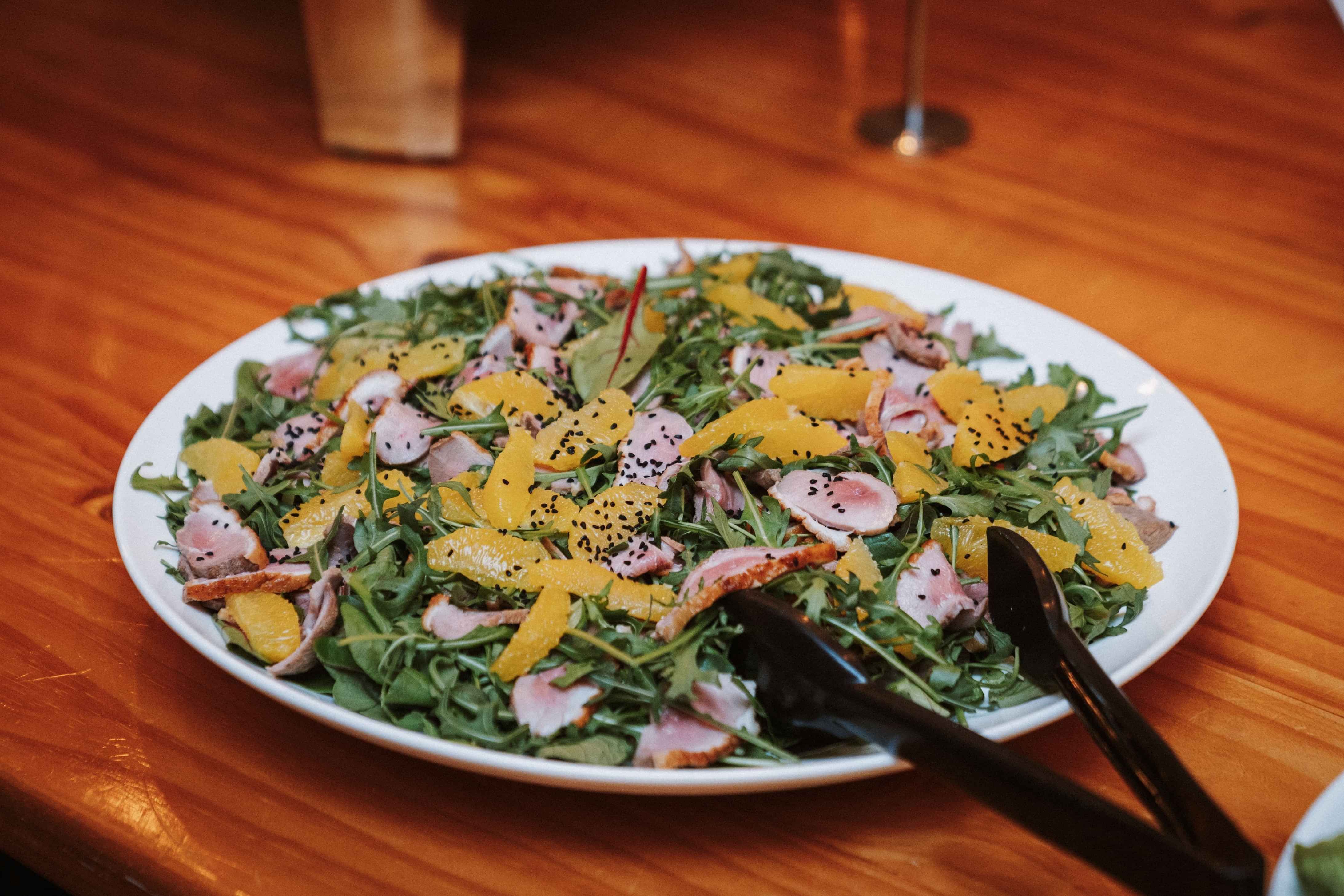 orange mesclun salad