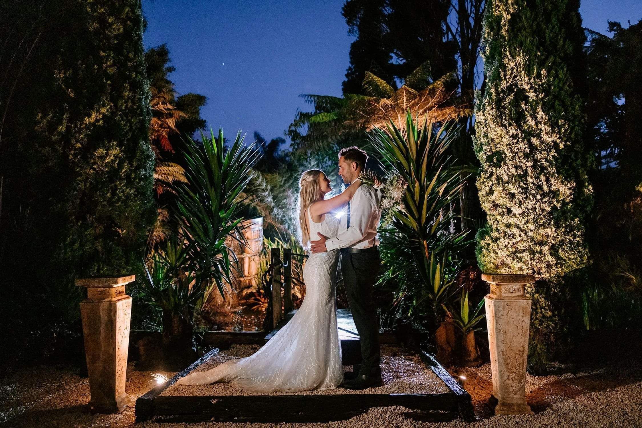 Markovina Vineyard Estate Bridal Couple posing in the trees