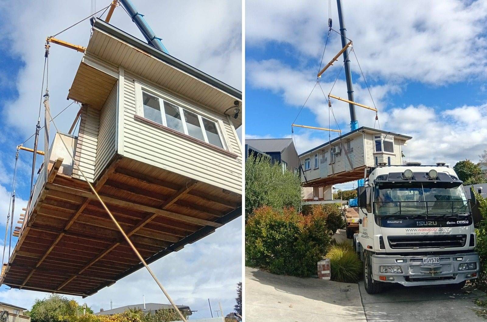 Crane lifting a section of house roof clear of power lines and bridges during a relocation