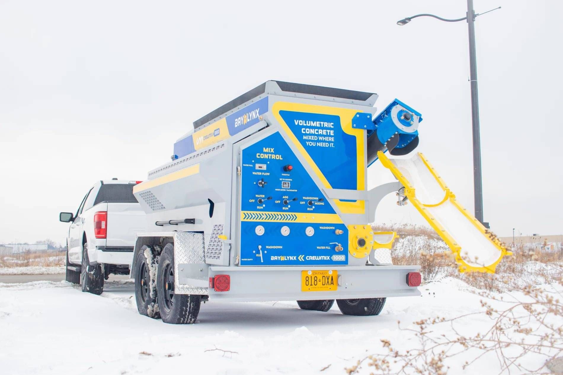 Crewmix CM1000 machine with Bay-Lynx signage at the World Of Concrete show 2026