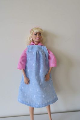 Blue overall dress with pink shirt