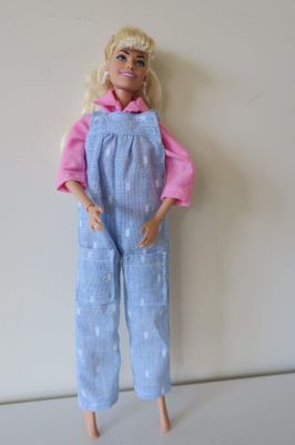 Blue overalls with pink shirt