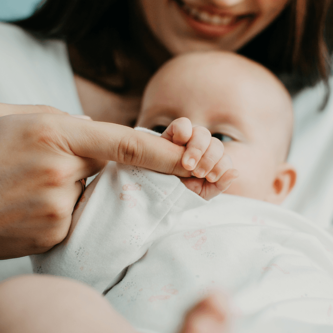 Baby gripping onto their parents finger - Beautiful Beginnings Postnatal Course