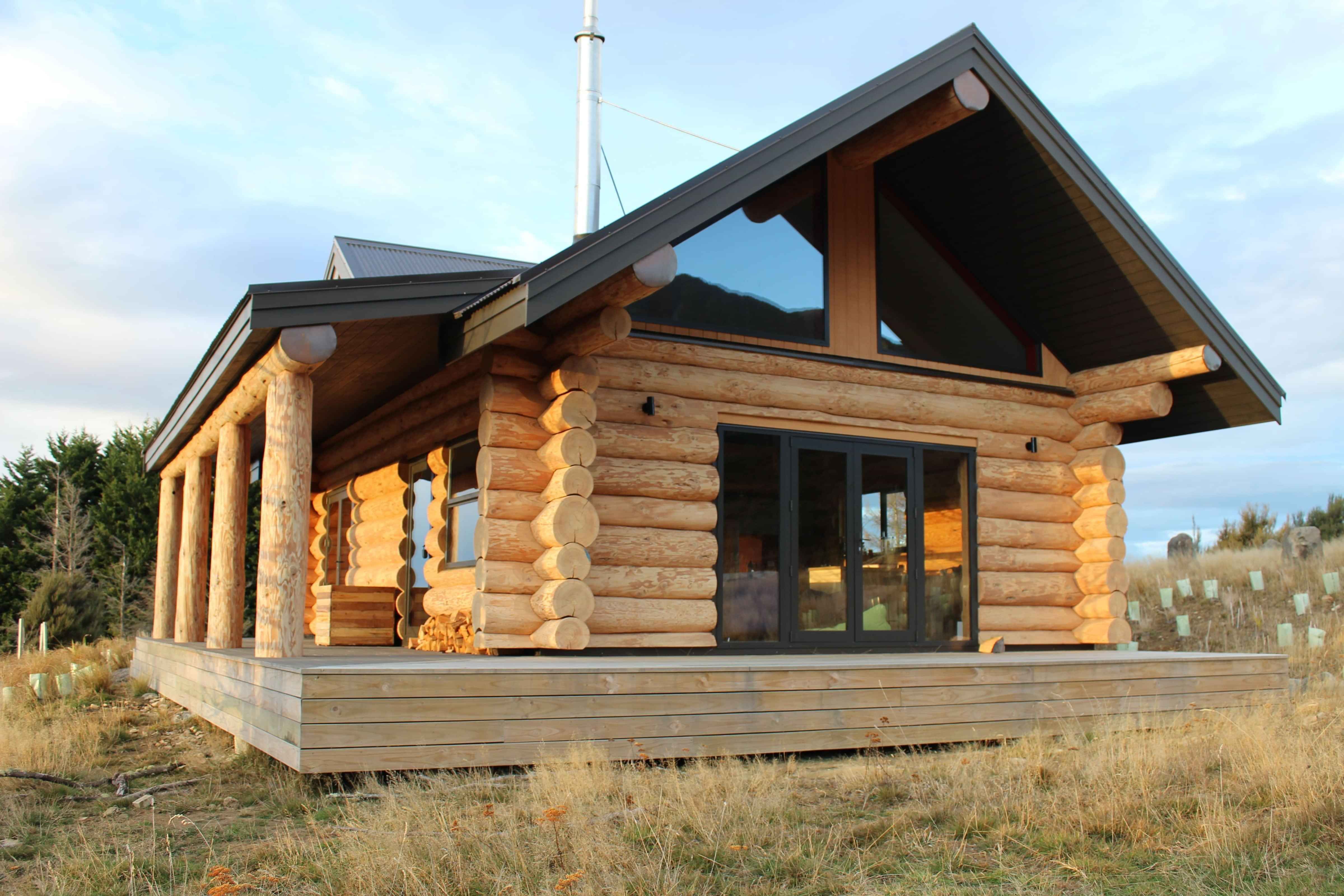 A log cabin built by the Scarlet Construction team.