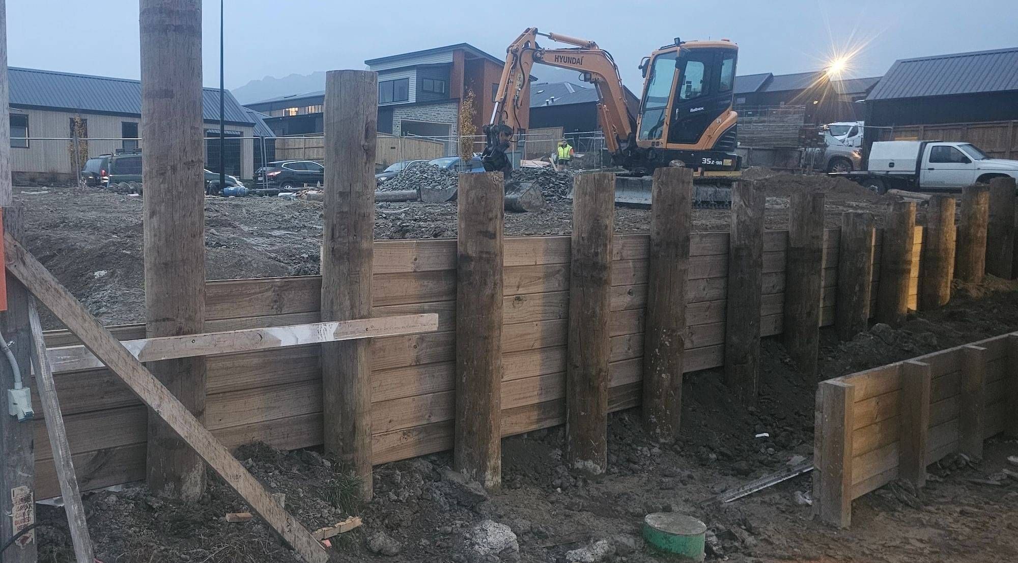 A timber retaining wall in progress on site in Hanleys Farm Queenstown.