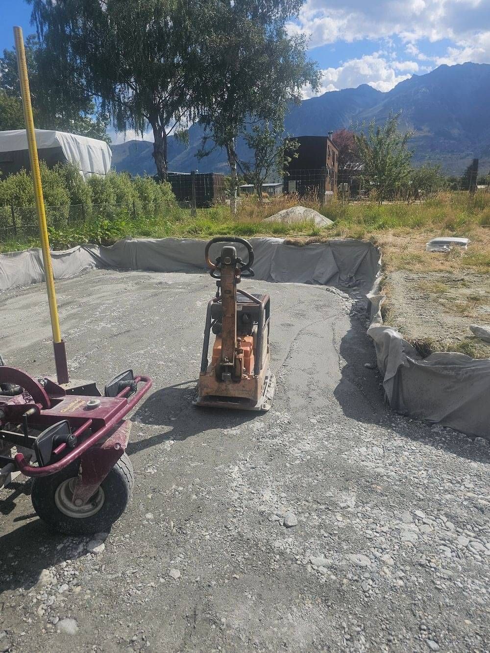 Levelling and compacting a section ready for foundations in Queenstown.