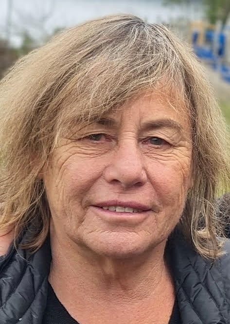 Photo of a woman with fair hair.