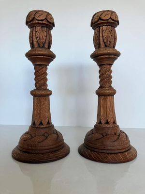 Pair of antique hand-carved gothic revival English oak candlesticks