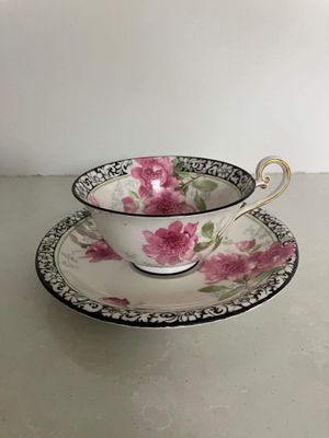 Royal Doulton Waratah Cup and Saucer with Black Floriate Border
