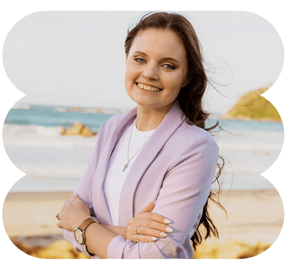 Laykanne Coetzee, owner and graphic designer at Rae Creative, smiling confidently