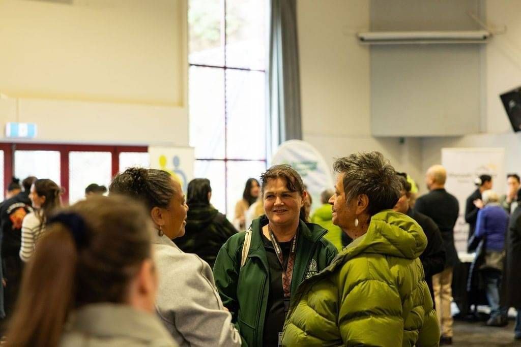 Crowd of people talking at the Eastern Bay Community Foundation Community Expo in Whakatane's The Liberty Centre