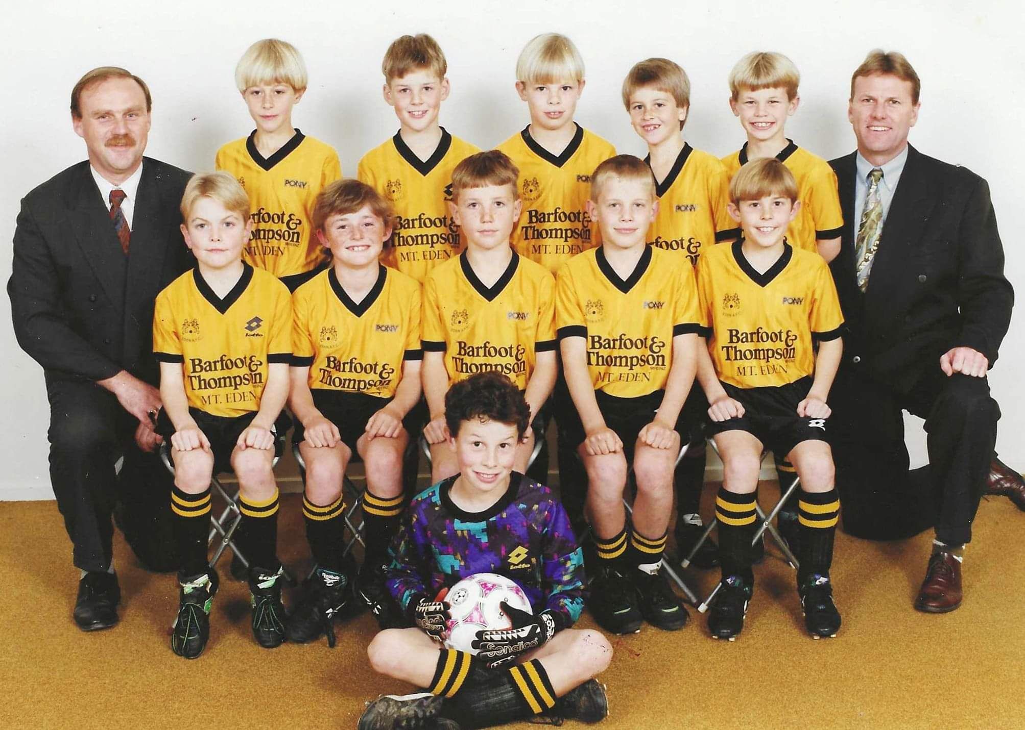 Auckland junior soccor team photo with Johan and James smiling in it.
