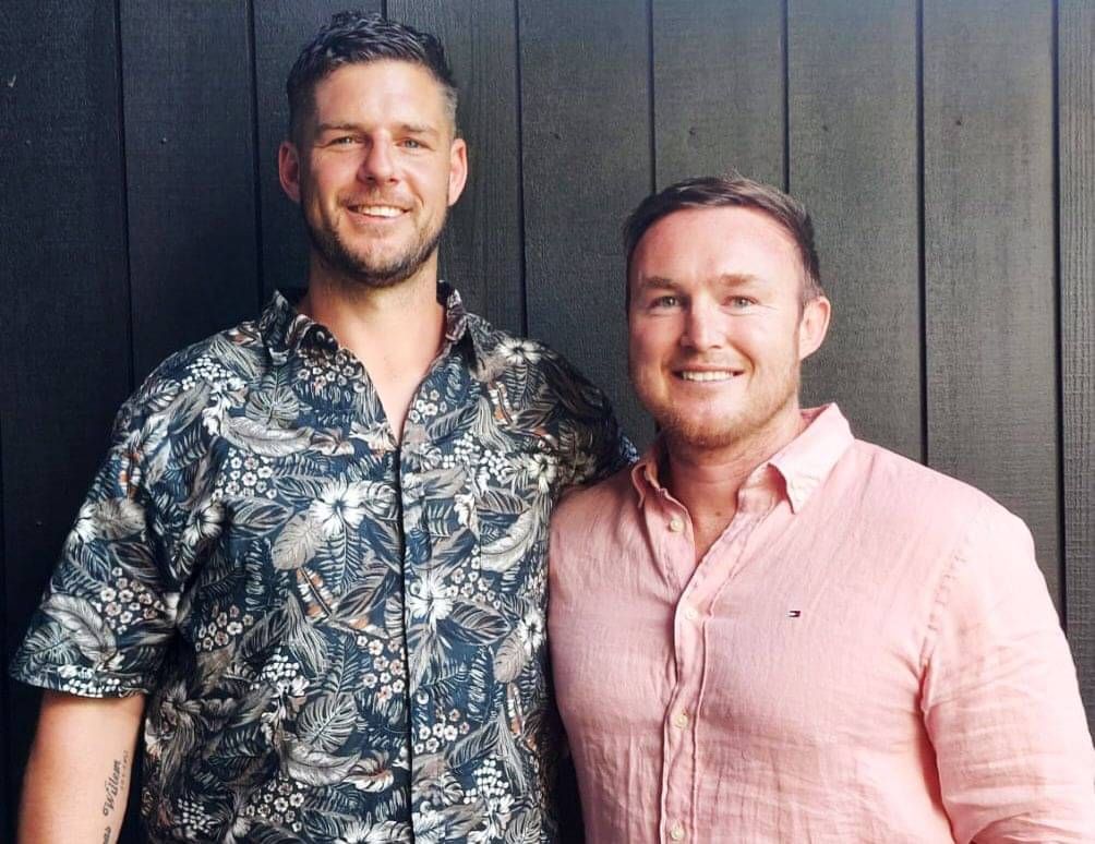 Photo of Johan Vollebregt and James Pilbro smiling together.