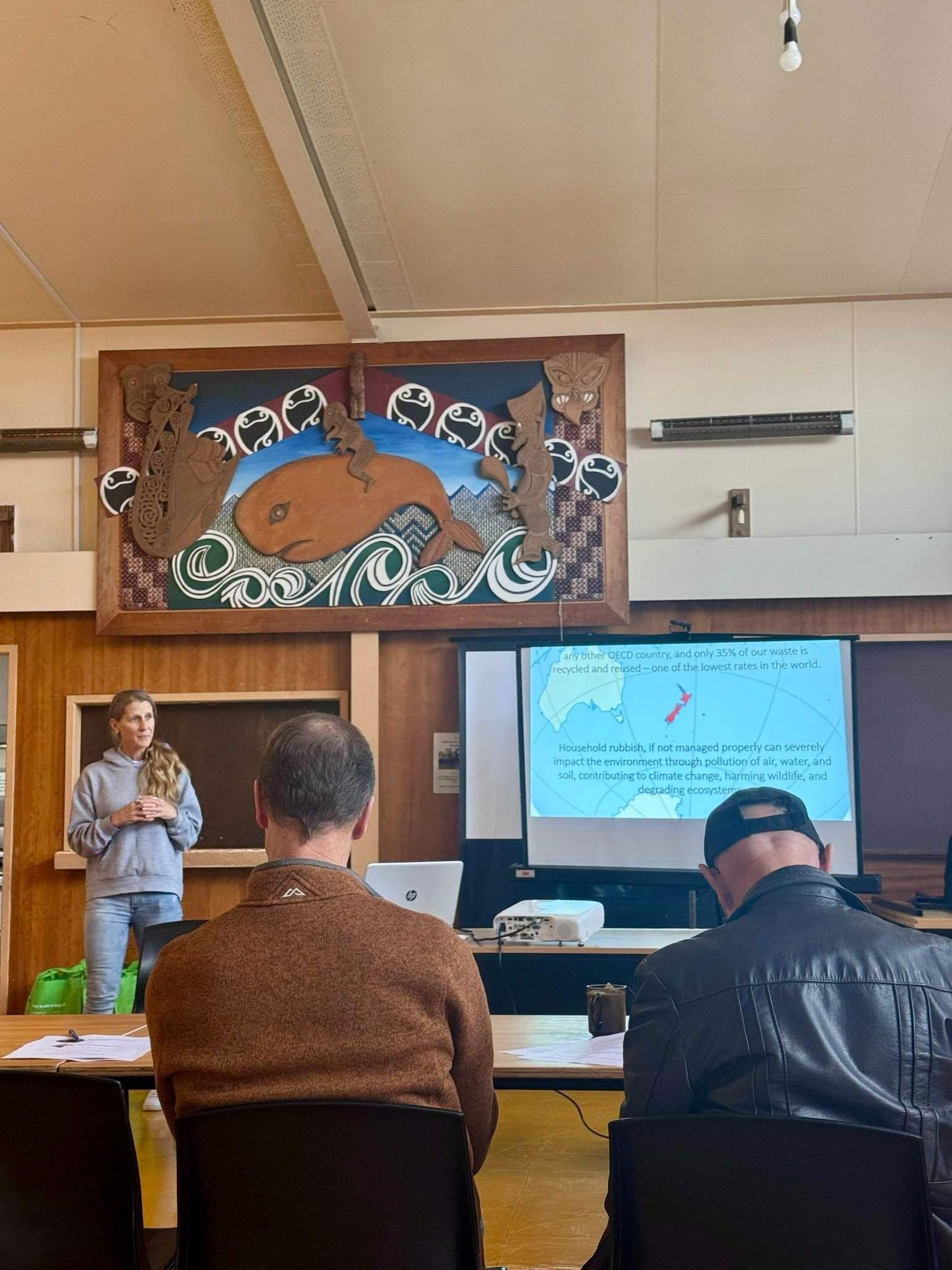 Presenter delivering a community education session on healthy homes and environmental wellbeing