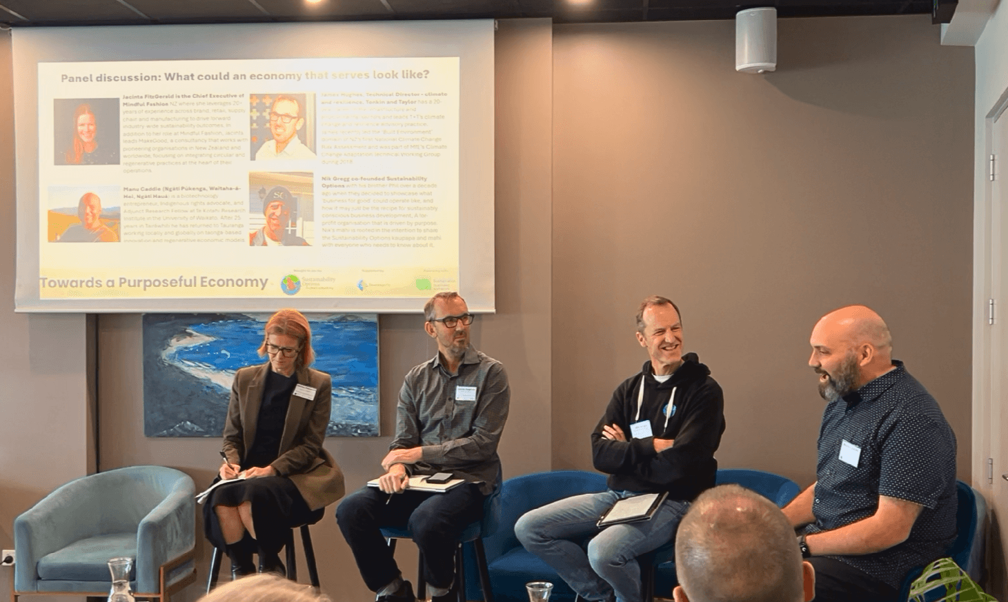 Panel of speakers participating in a community discussion event