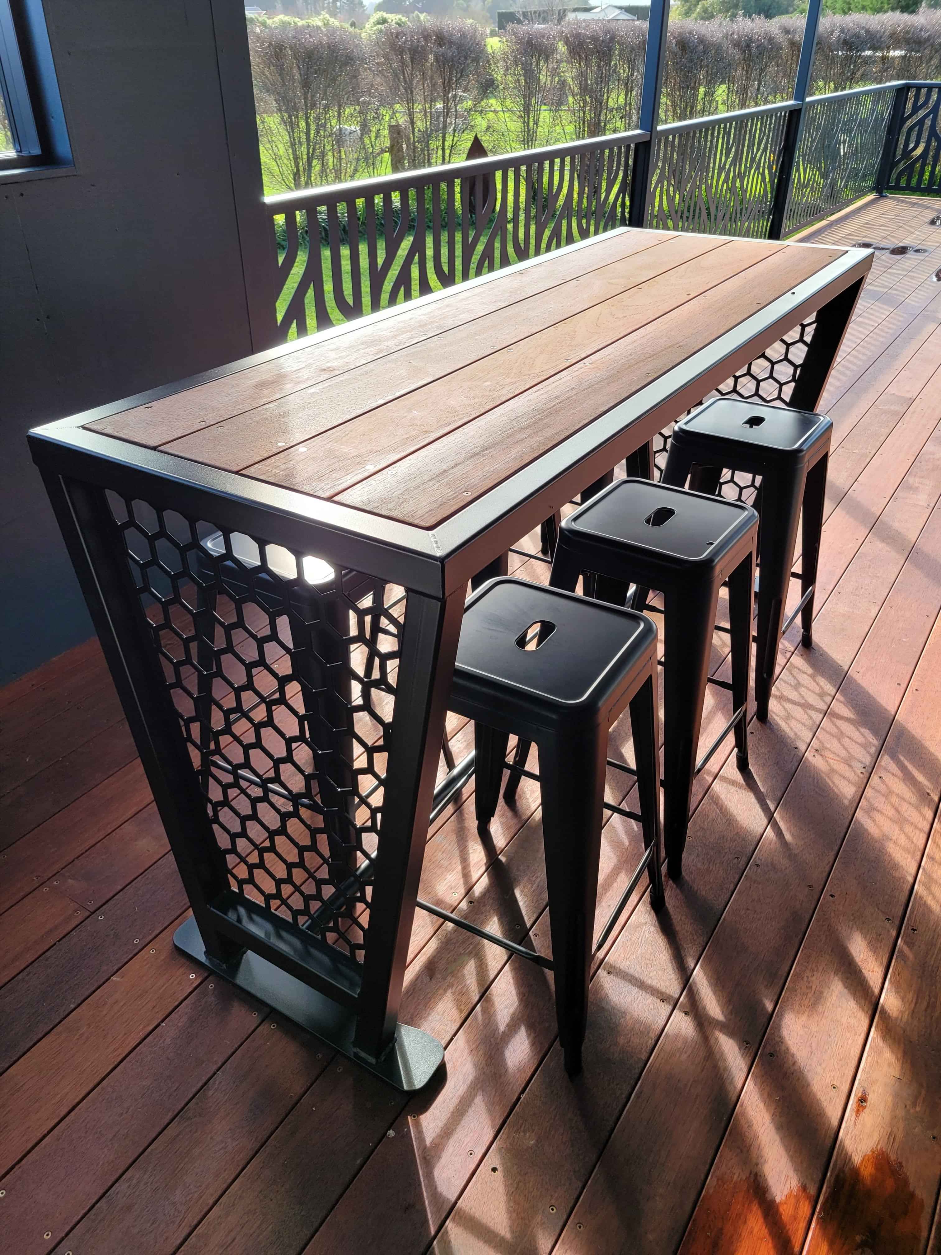 Bespoke metal gates and handcrafted furniture by Complete Custom Engineering.