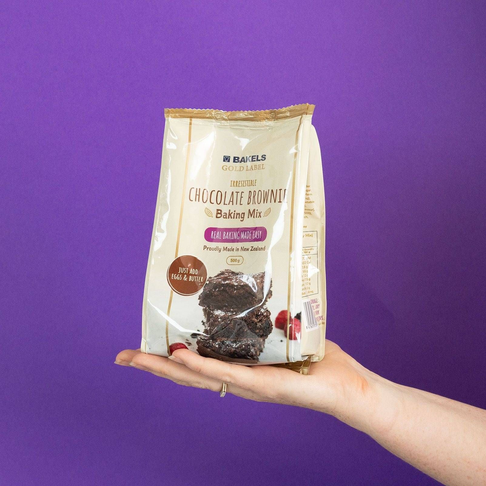 Bakels Gold Label Packaging Design in front of purple background.