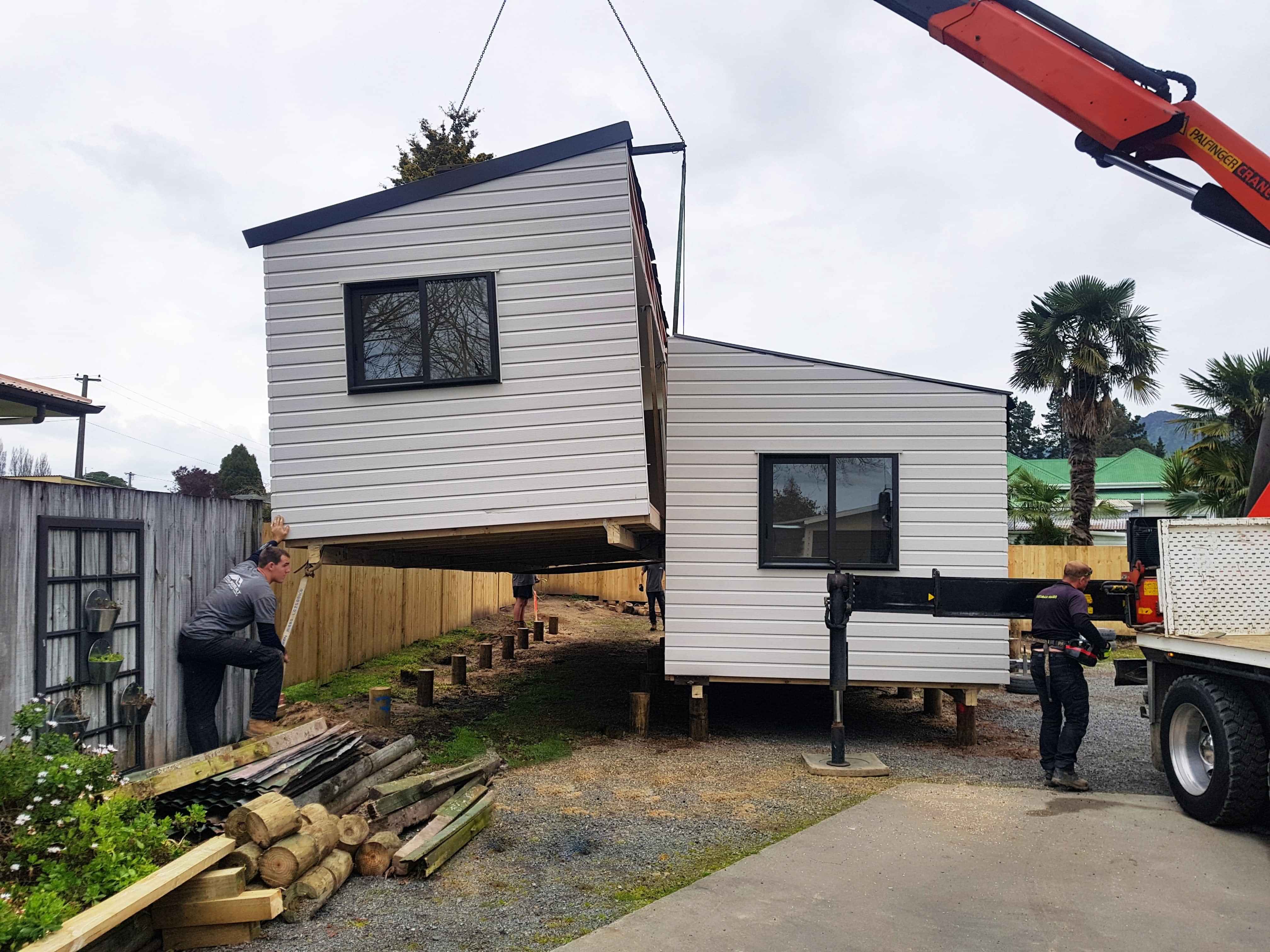 Duplex transportable unit split into two components for easy delivery