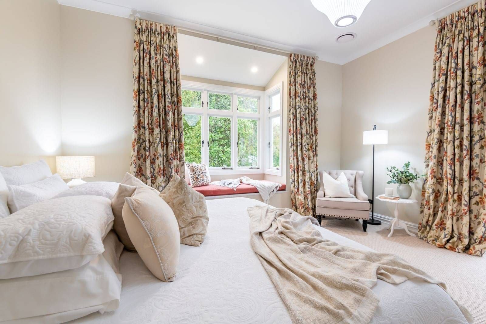 Image of heritage master bedroom with window seat. Heritage home renovated & restored by Whitechurch Construction, Waikato residential builders.