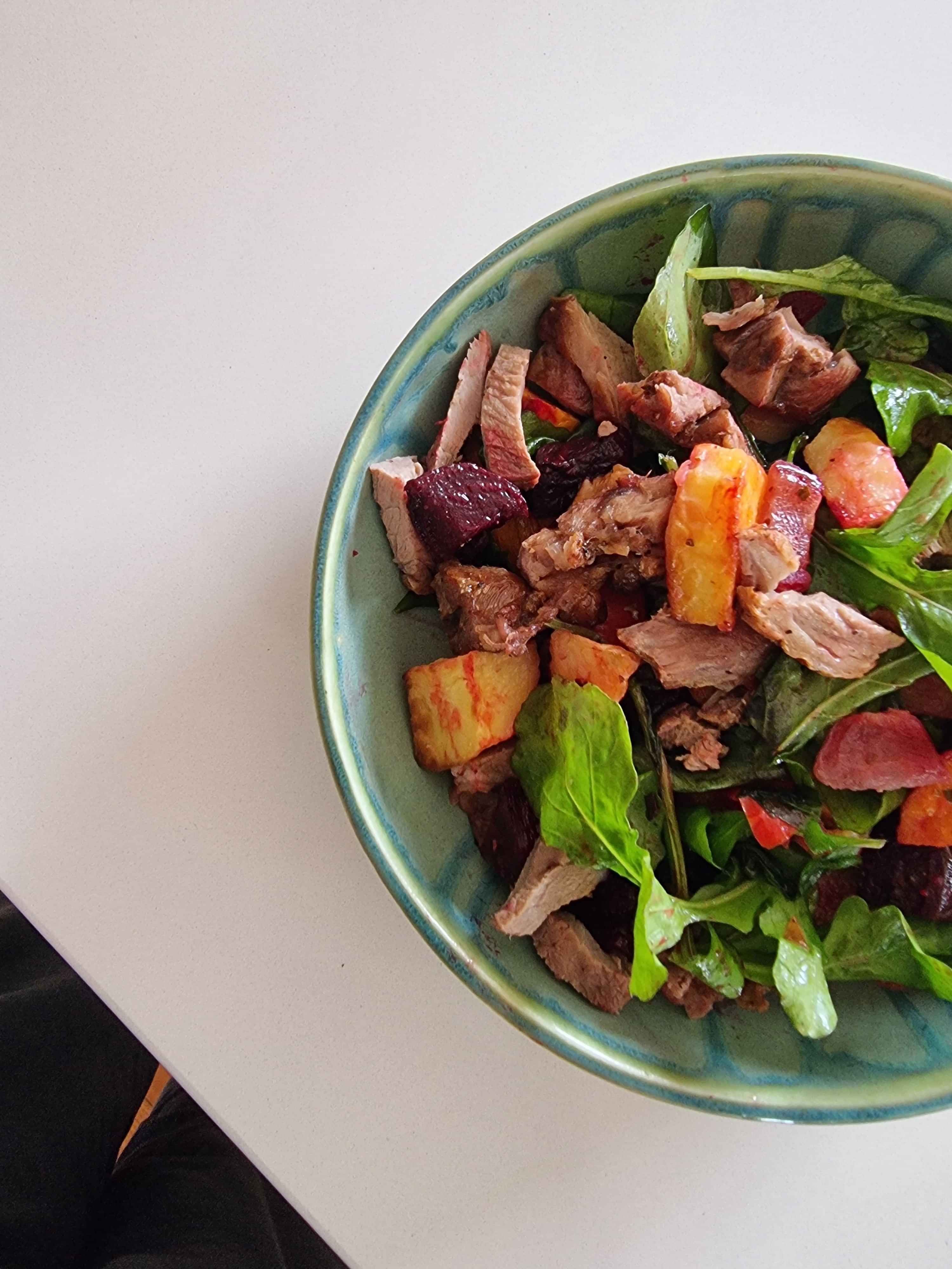 Photo of Elizabeth's, holistic health nutrition coach, grating a lemon in a kitchen.