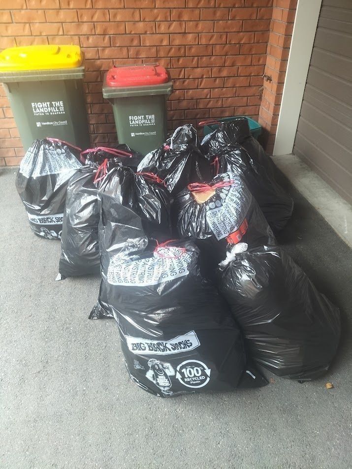a pile of rubbish bags