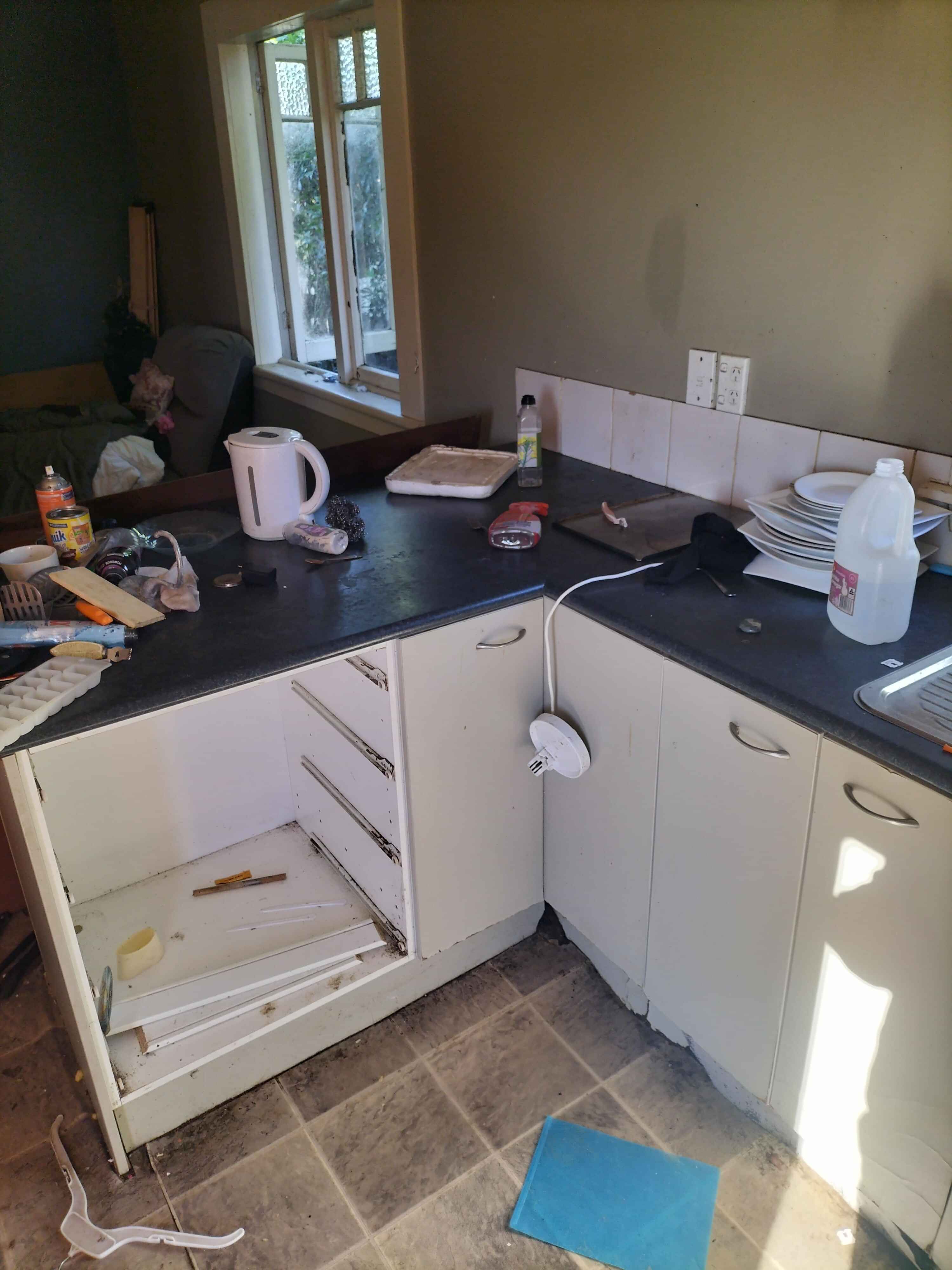 Junk furniture loaded on back of collection truck