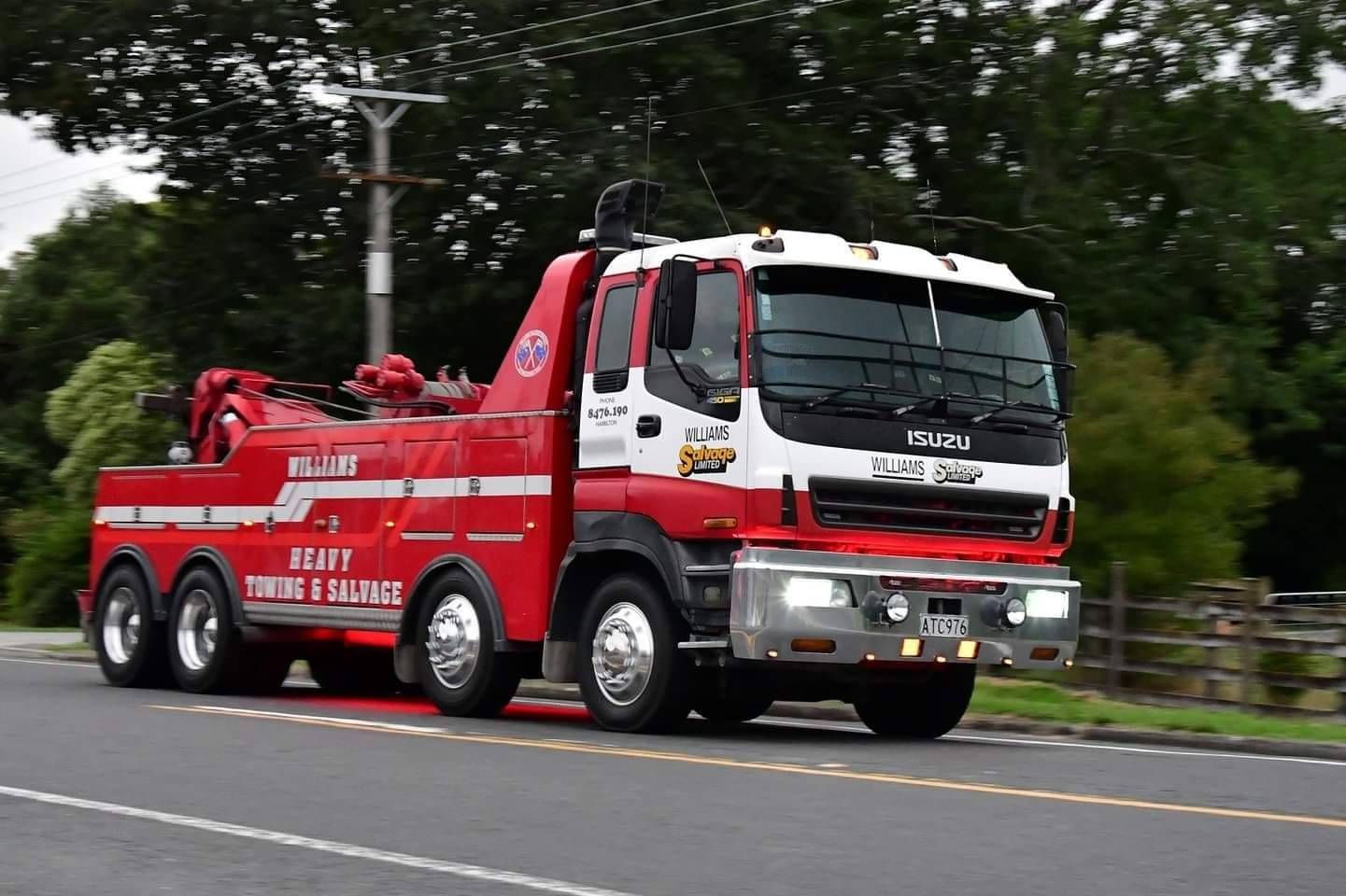 williams salvage tow truck on a road