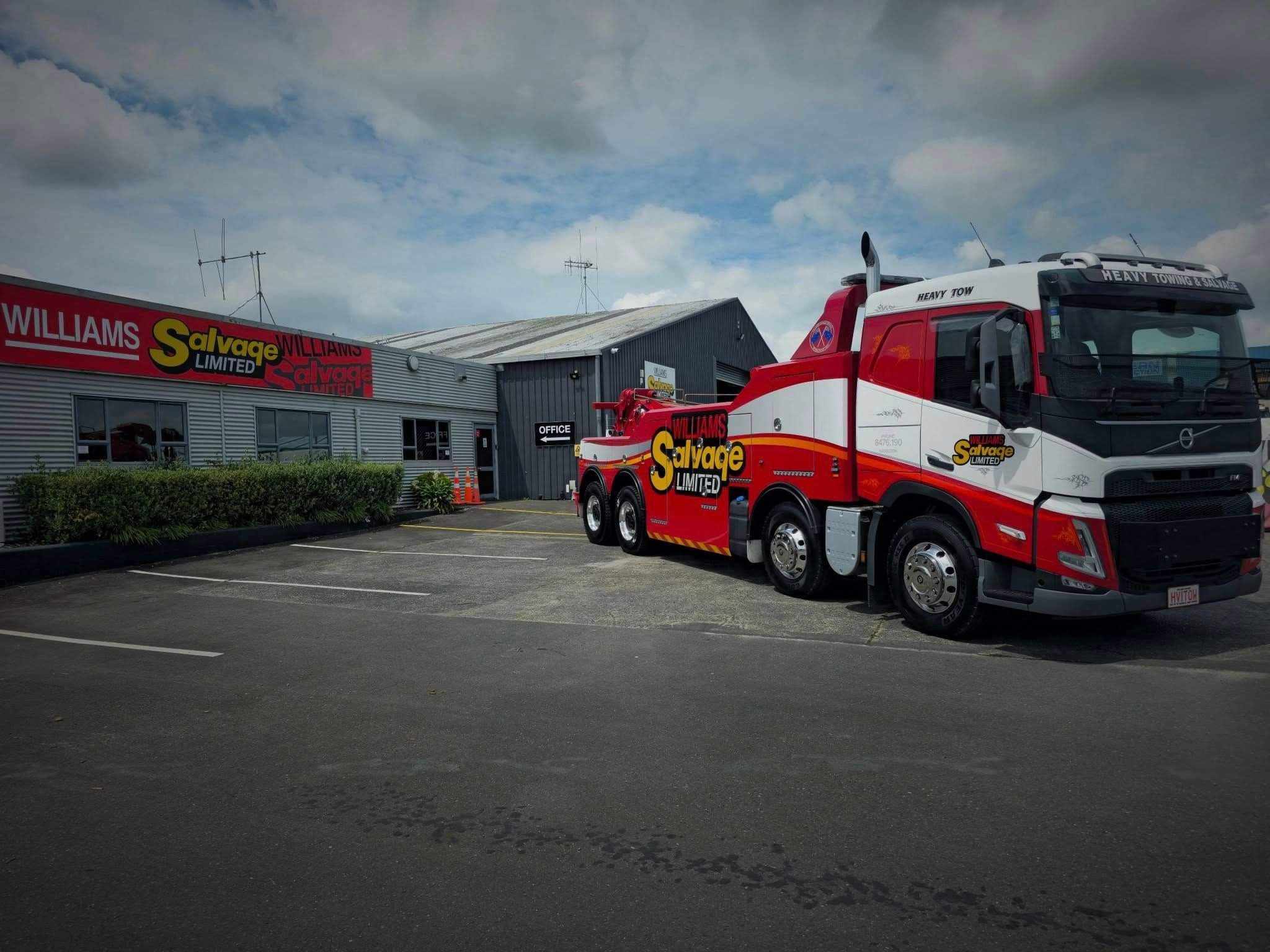 Williams Salvage tow truck outside their offices