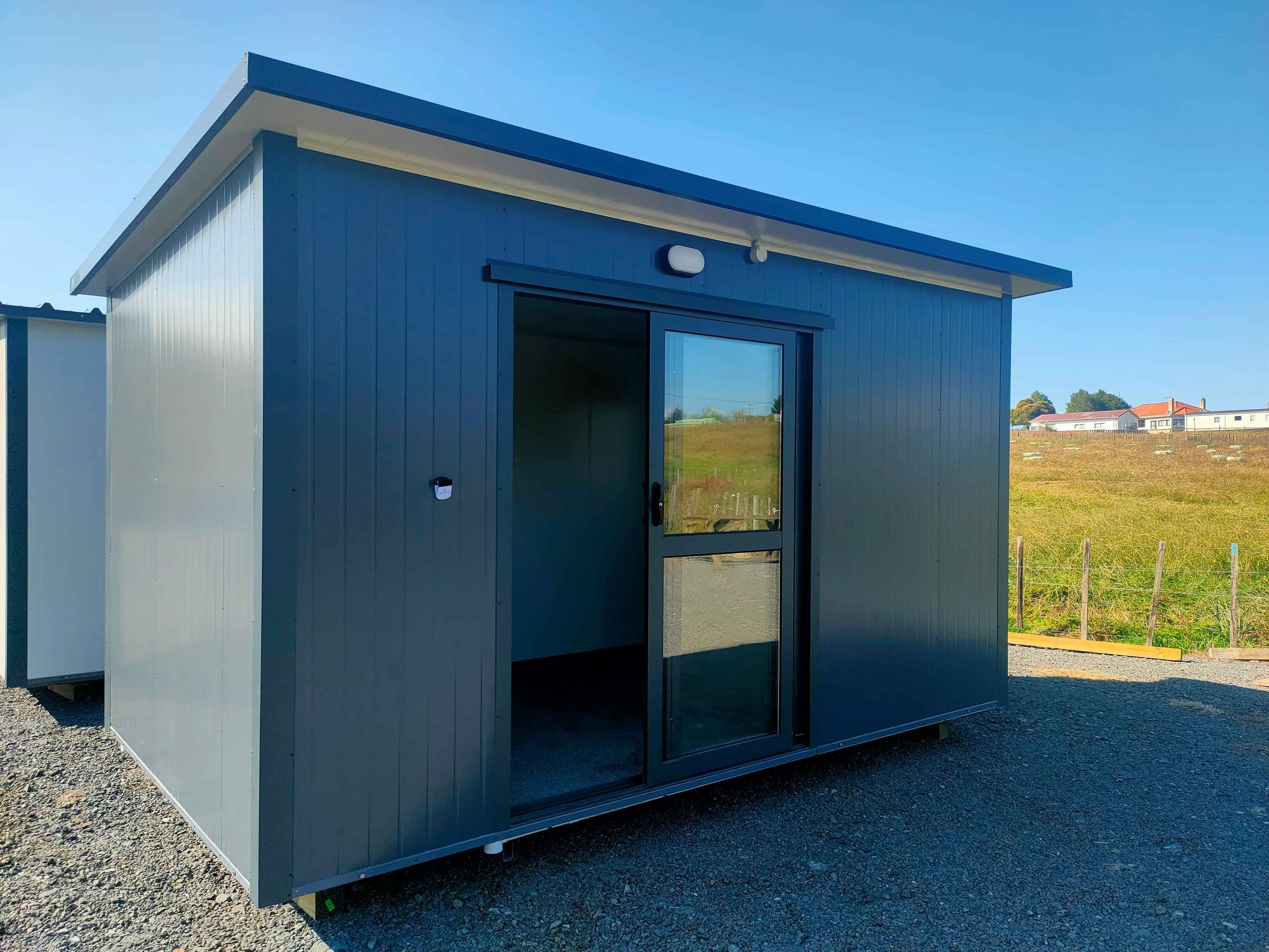 4.1m x 2.4m white cabin with window on the left short wall