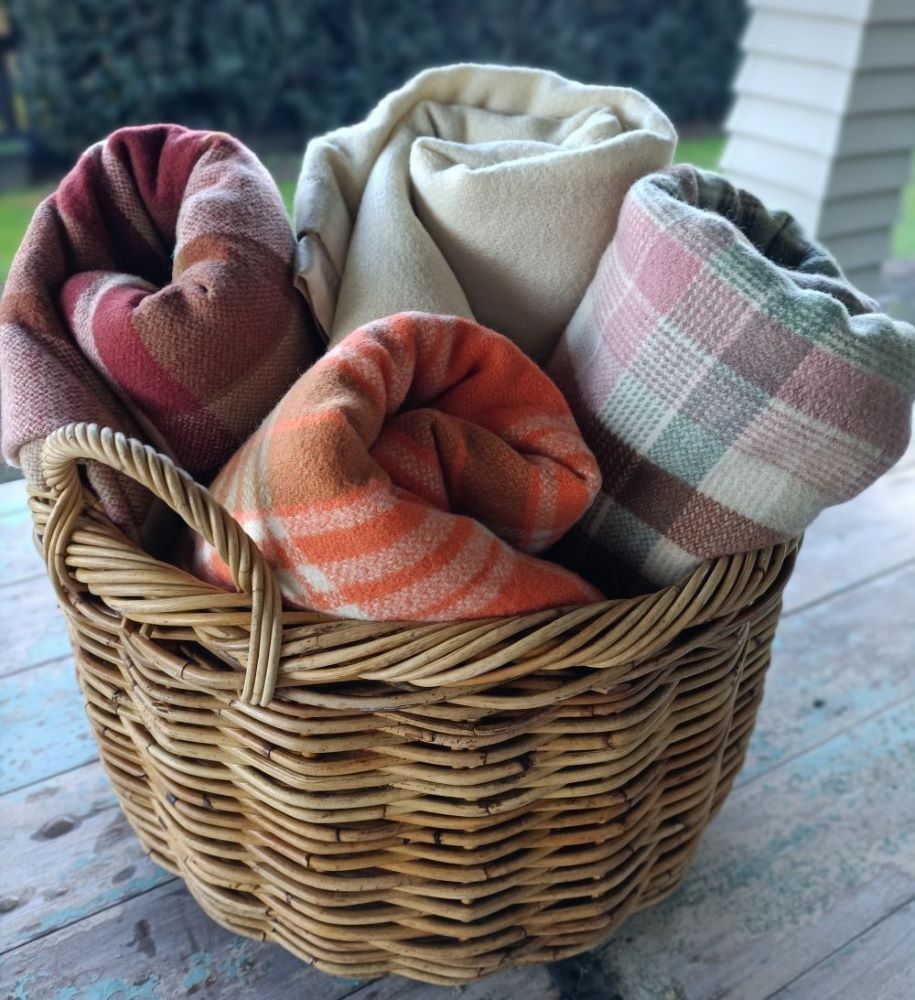 vintage picnic blankets rolled up