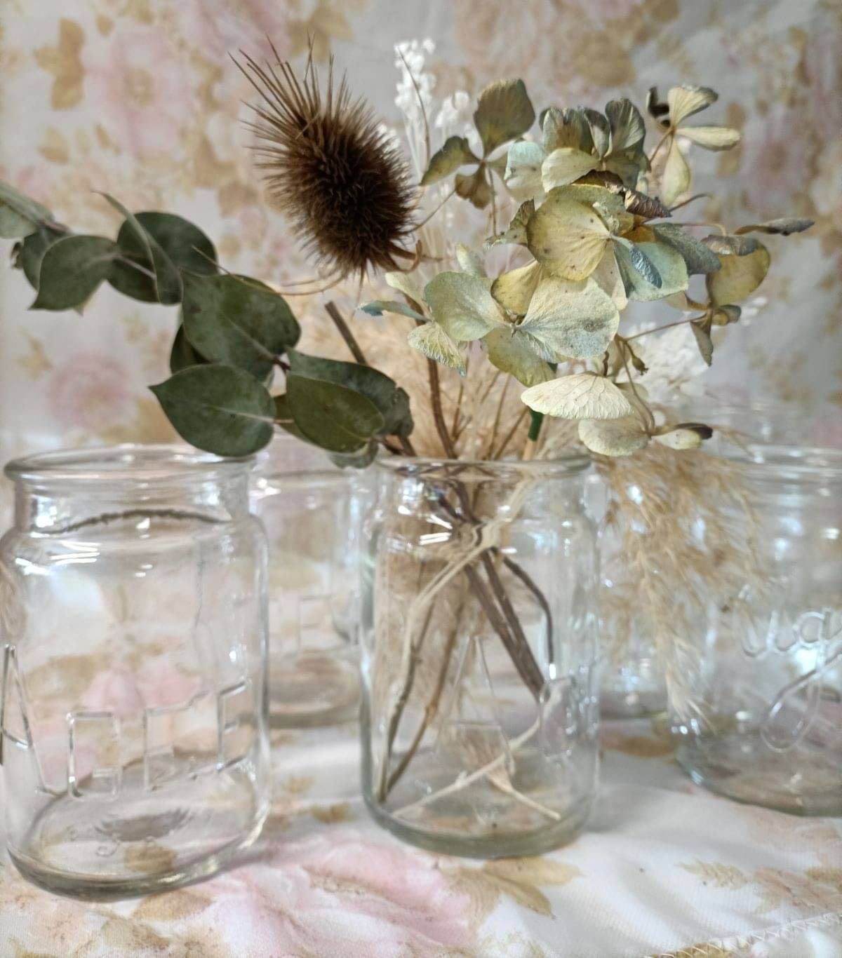 vintage glass bottles with flowers