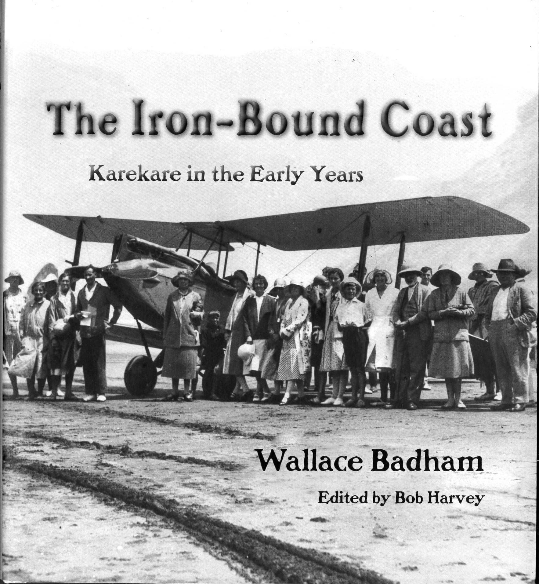 Book cover with a black and white photo of a bi-plane and a large group of people standing in front of it